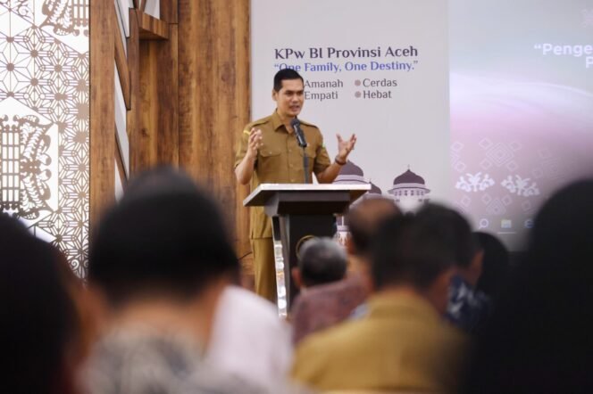 
					Plt Sekda Aceh, M. Nasir S.IP, M.PA, memberi sambutan sekaligus membuka Aceh Economic Forum Maret 2025, di Auditorium Teuku Umar Kantor BI Aceh, Selasa, 18/3/2025.