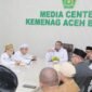 Kakankemenag Aceh Besar H Saifuddin SE memimpin rapat bersama penentuan besaran zakat fitrah 1447 H di Ruang Media Center Kemenag Aceh Besar, Senin, 9 Maret 2026.

Foto/Humas Kemenag Aceh