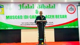 Ketua Ikatan DokterIndonesia (IDI) Cabang Aceh Besar, dr. Aidil Fitria memberikan sambutan Musyawarah Cabang (Muscab) Ikatan Dokter
Indonesia (IDI) Cabang Aceh Besar  yang digelar di Hotel Rasamala, Minggu (26/4/2026). FOTO/MC ACEH BESAR