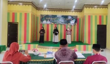 
Sejumlah peserta Kafilah MTQ Kecamatan Kuta Malaka mengikuti simulasi penampilan dalam kegiatan pembinaan dan persiapan menghadapi MTQ ke-XXXV Kabupaten Aceh Besar di Aula UDKP Kecamatan Kuta Malaka, Kamis (8/10/2026). Foto: (Kecamatan Kuta Malaka)